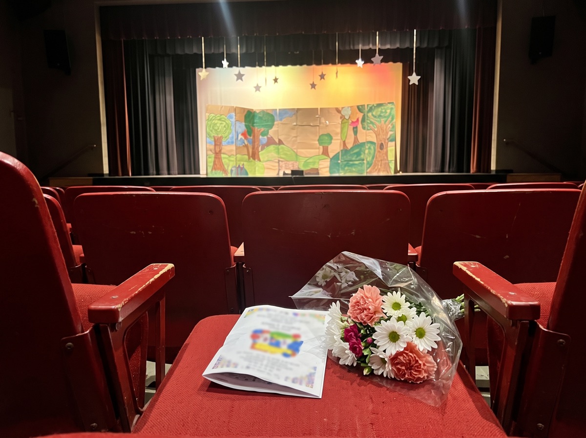 A school auditorium before a children's play